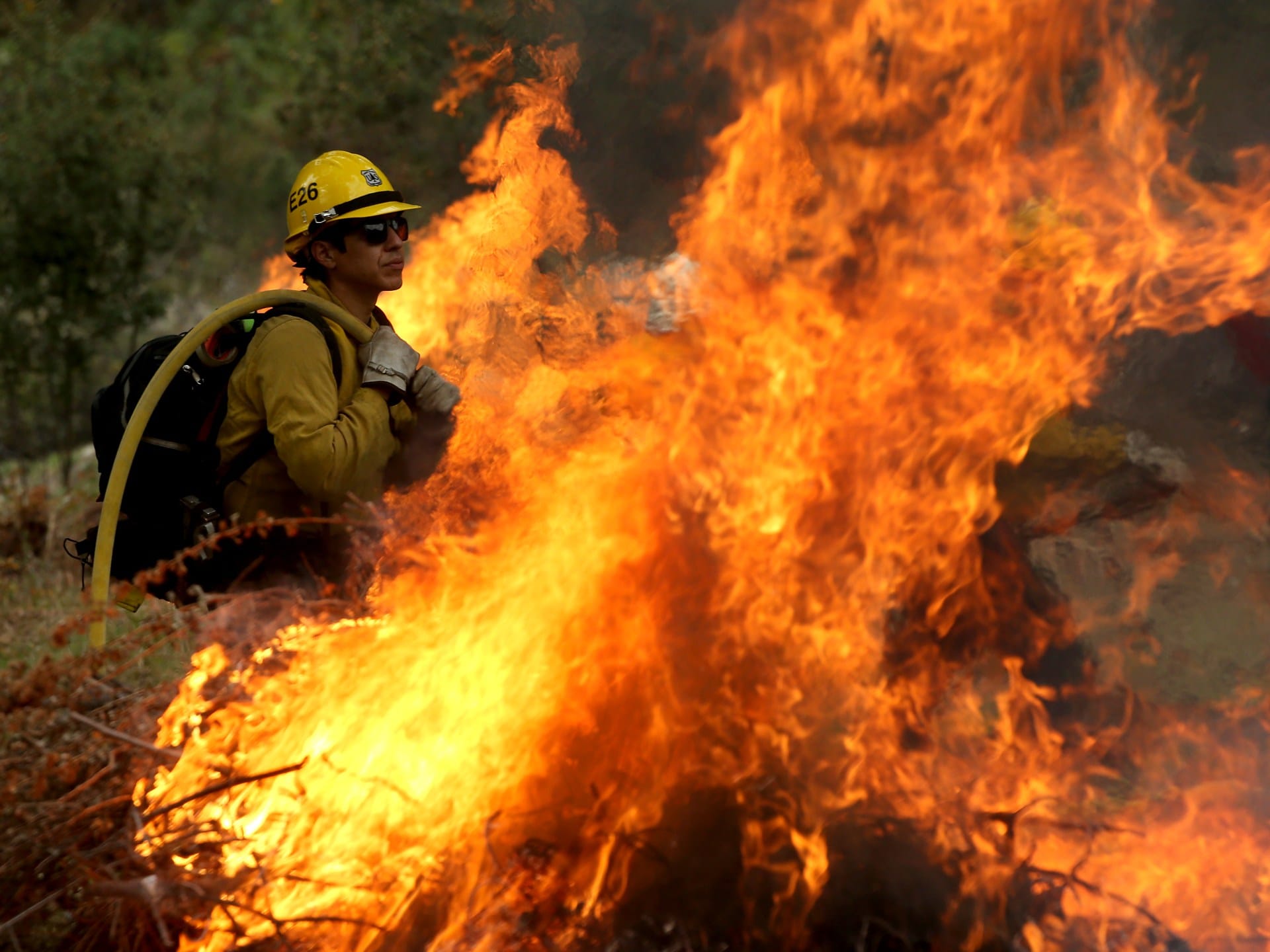 Lives on the line: Low pay has US wildland firefighters quitting | Environment News Lives on the line: Low pay has US wildland firefighters quitting | Environment News