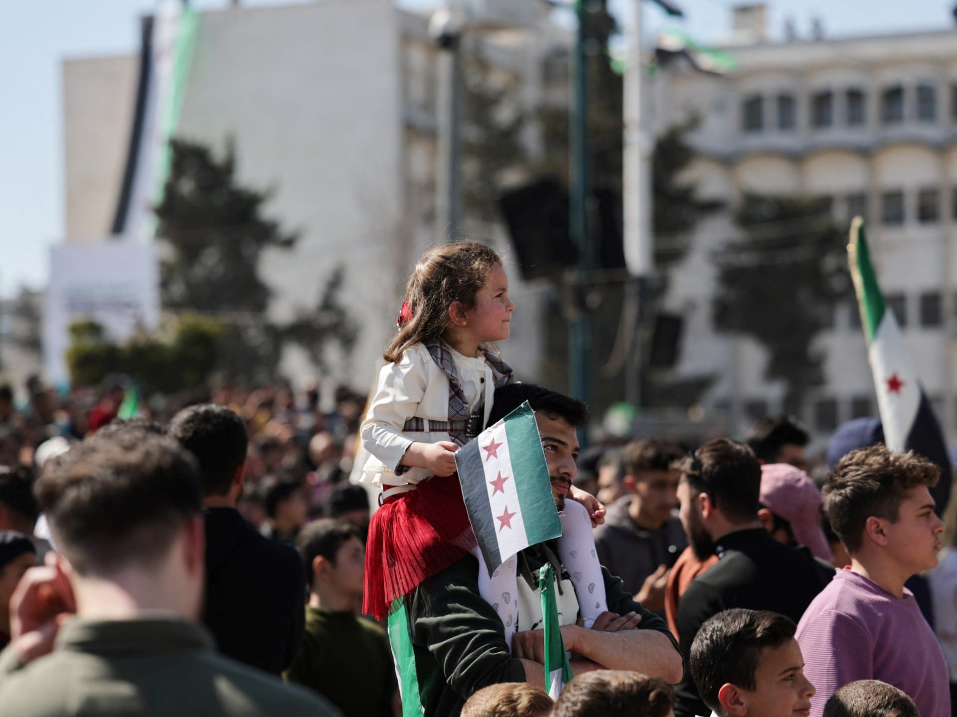 Syrians mark revolution anniversary with roses, songs and tight security | News Syrians mark revolution anniversary with roses, songs and tight security | News