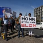 Elon Musk protesters gather at Tesla showrooms | Donald Trump News