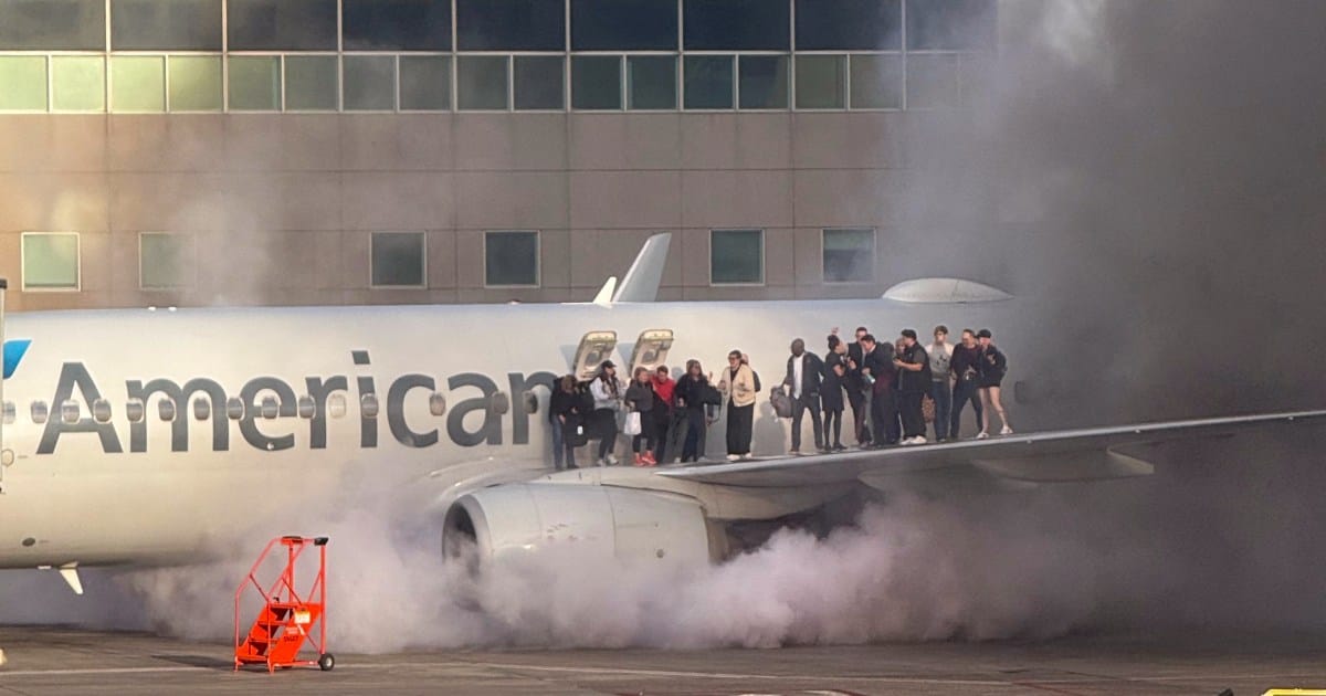 Passengers evacuate after American Airlines plane catches fire in Denver | Aviation News