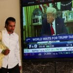 Trump’s 10 percent tariff takes effect, raising fears of global trade war | Donald Trump News