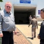 US academic free on bail in Thailand before trial over royal insult | Politics News